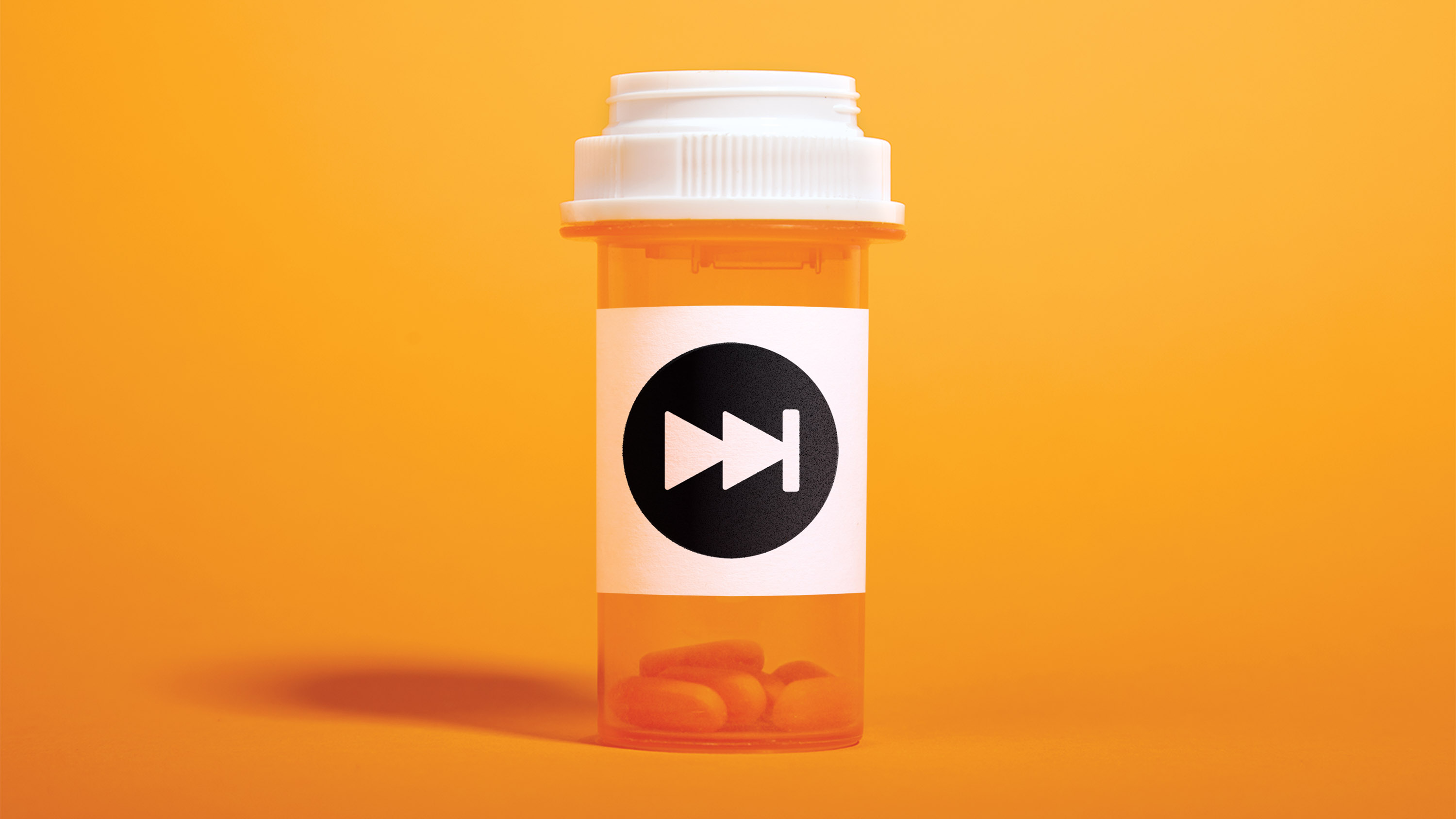 a bottle of pills with a "fast forward" icon on the label